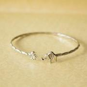 Elephant cuff bracelet with a penguin wrap style
