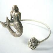 Silver Mermaid cuff bracelet with a shell wrap style